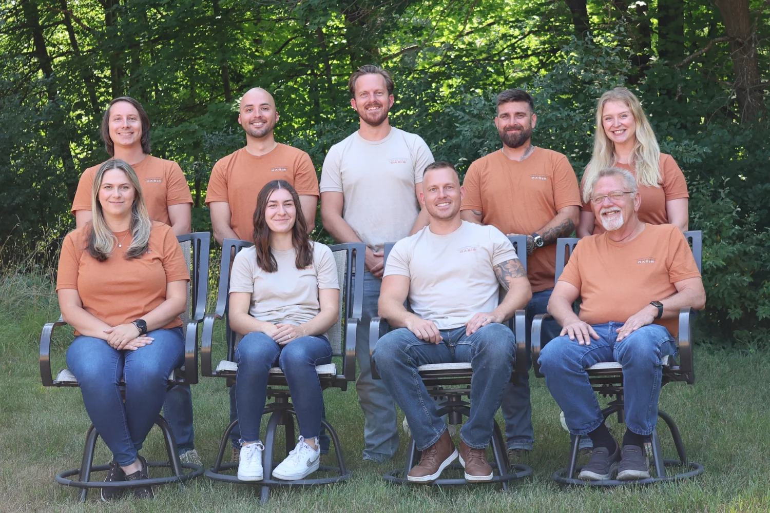 The Under Deck Oasis team gathered outdoors