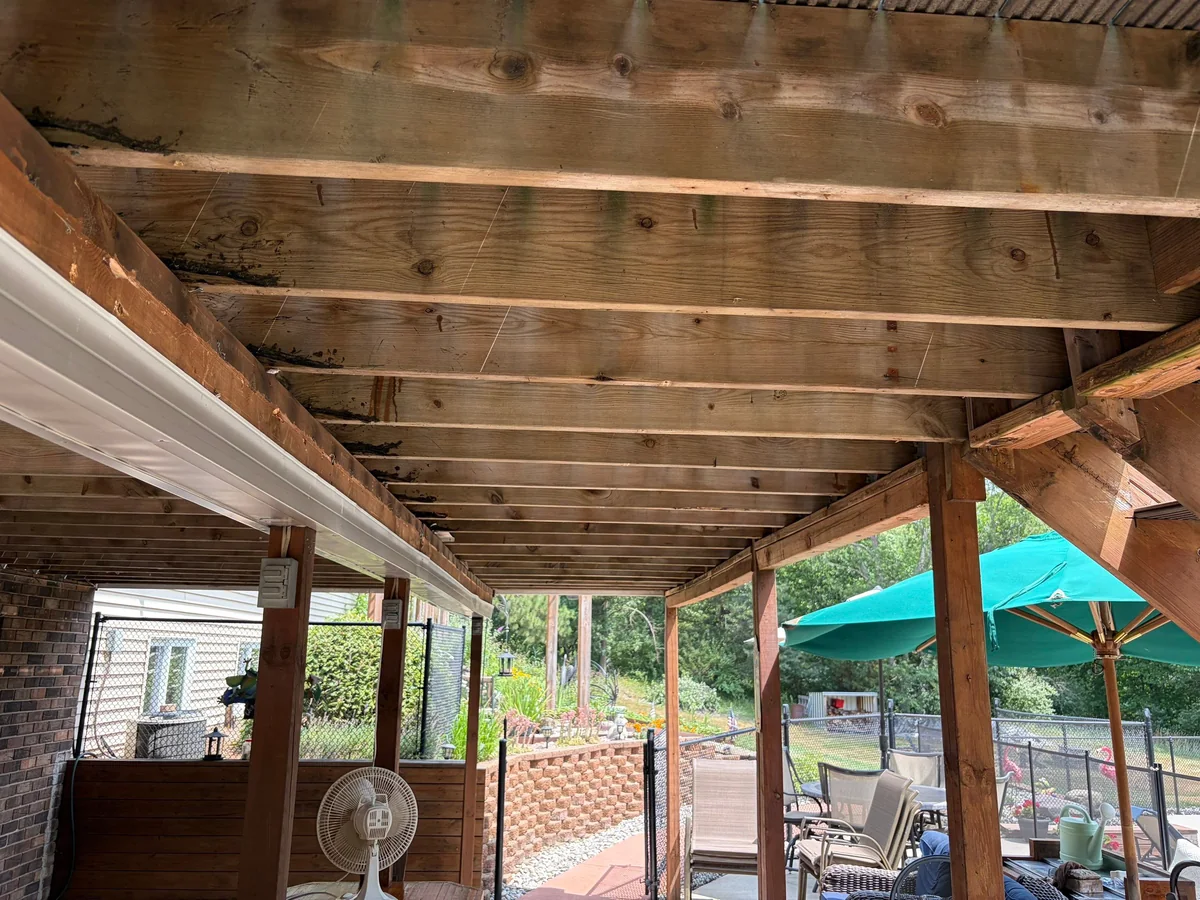 Dry deck framing exposed after an Under Deck Oasis ceiling was removed