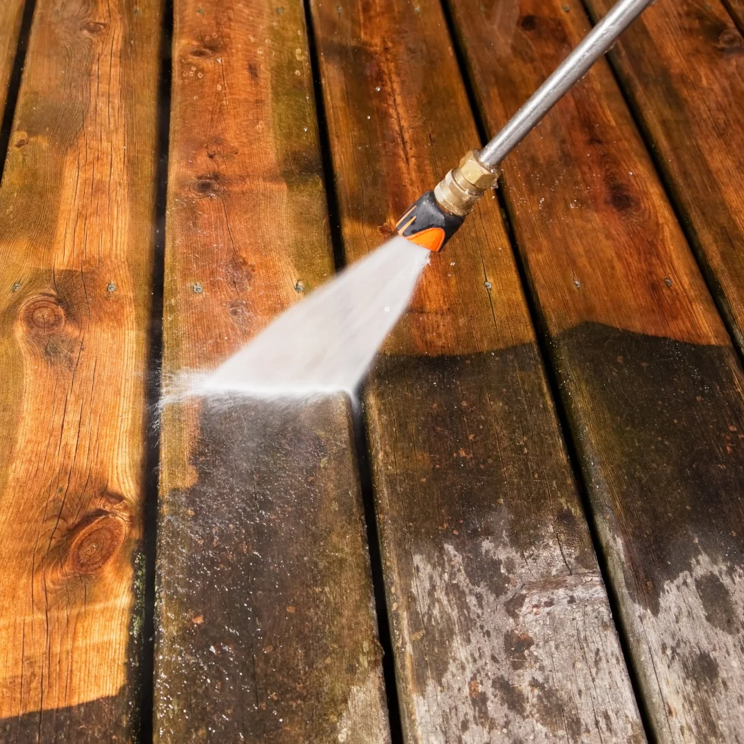 Water spray cleaning wood deck boards