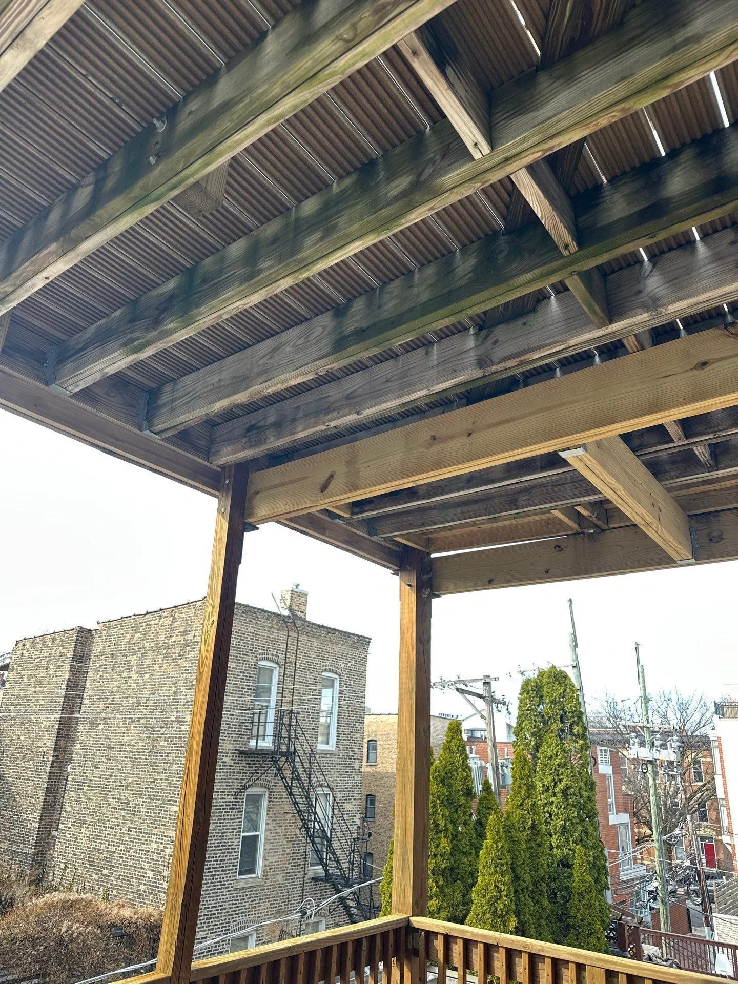 Multiple framing levels and dropped beams beneath the Chicago deck before installation