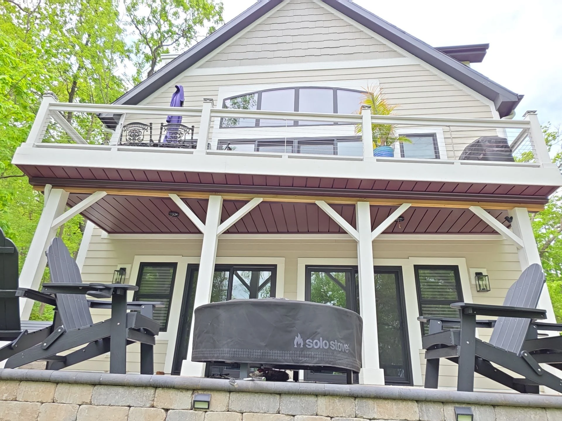 Rustic Dark Mahogany ceiling beneath a Lake Geneva deck