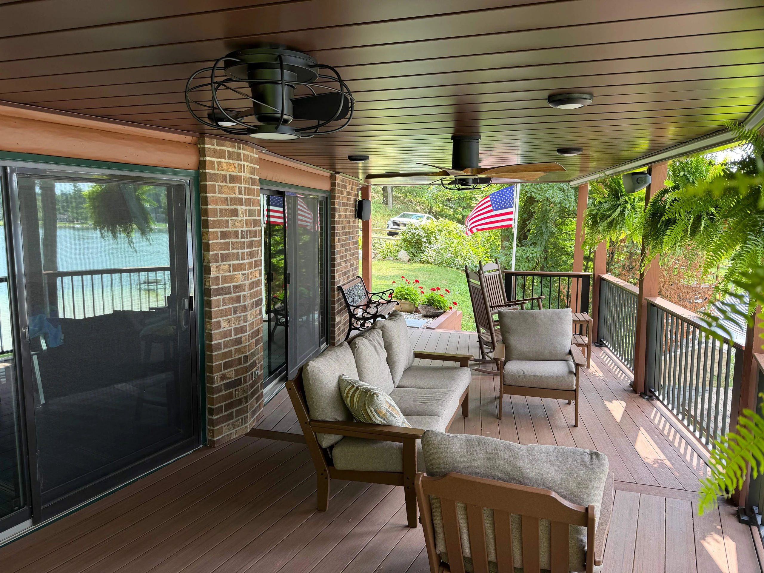 Newaygo lakefront porch with three interactive project callouts