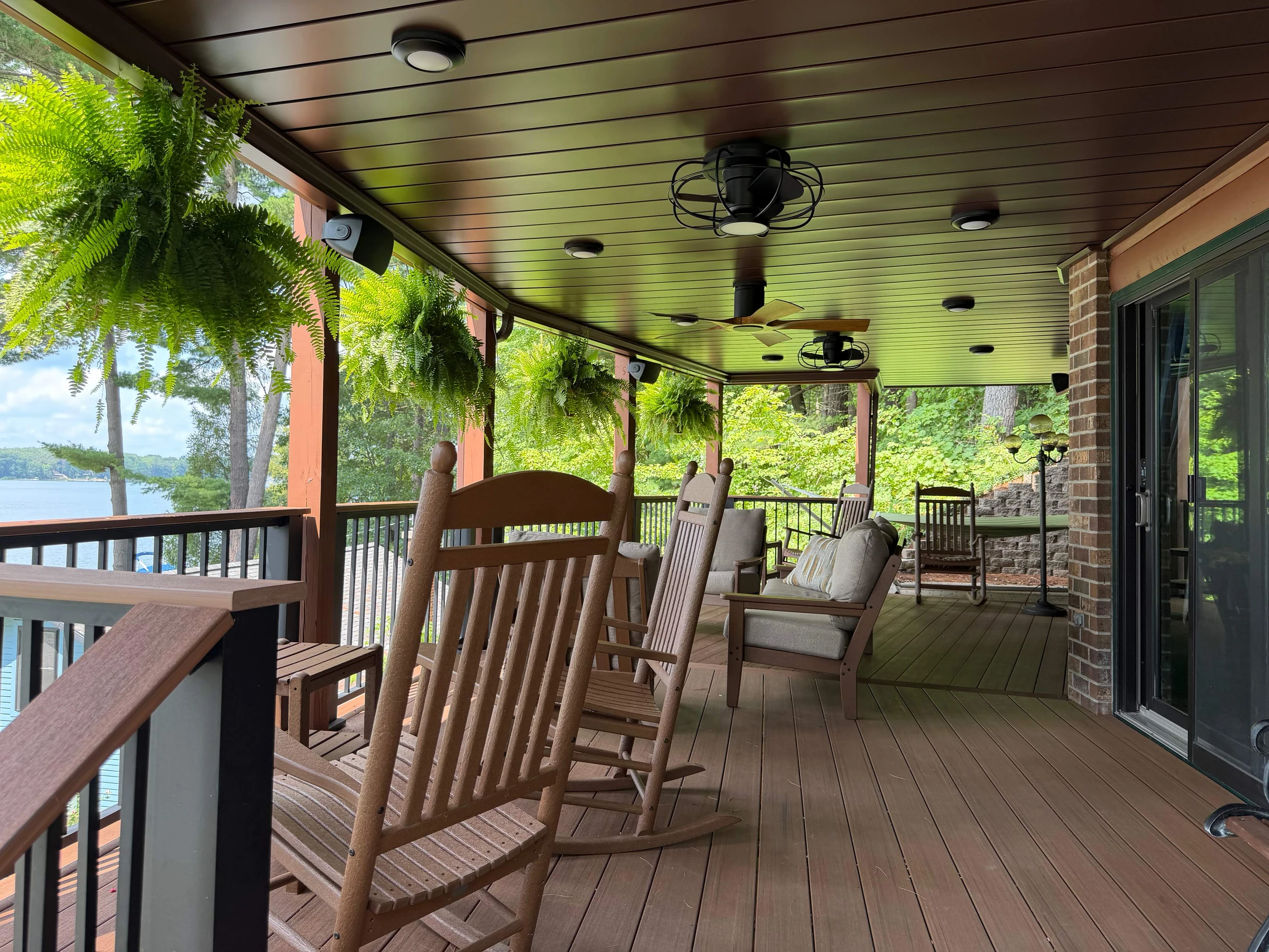 Smooth Brown ceiling above a furnished lakefront porch